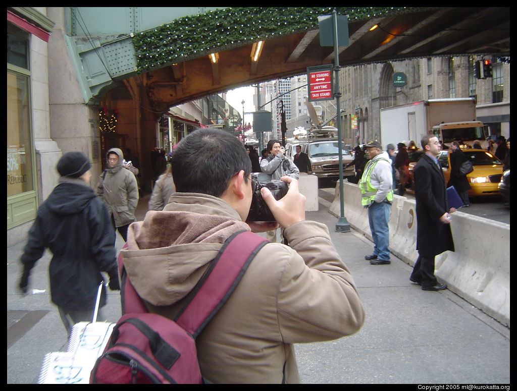 some dudes photographing a striker