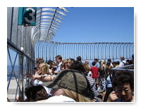 crowd on the 86th floor of the Empire State Building