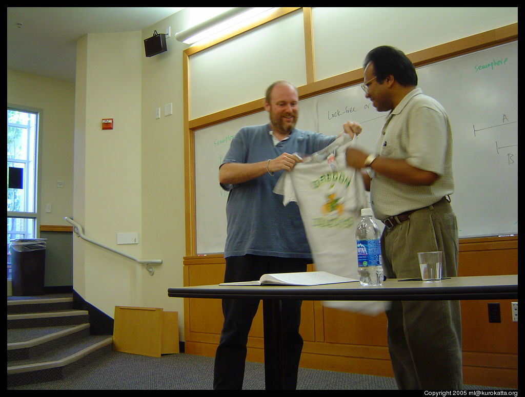 Jim giving Reddy his «angry duck» tee